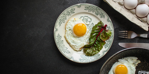 fried eggs, healthy food (delicious snack) menu concept. food background. top view. copy space