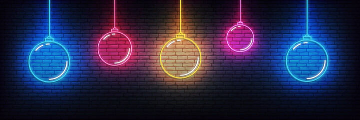 Christmas ball neon background. Set of realistic colorful Xmas glowing decorations © Stock Vector One