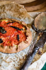 galeta baking with tomatoes and ricotta basil