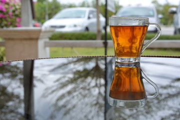hot tea healthy drink put on glass table in the morning time