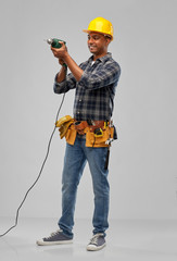 profession, construction and building - happy smiling indian worker or builder in helmet with...