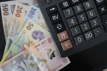 Romanian banknotes and  calculator