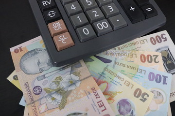Romanian banknotes and  calculator