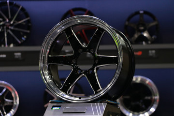 Alloy Wheel of car on the shelf. Alloy wheels are wheels that are made from an alloy of aluminium or magnesium. Alloys are mixtures of a metal.