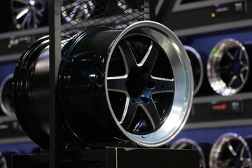 Alloy Wheel of car on the shelf. Alloy wheels are wheels that are made from an alloy of aluminium...