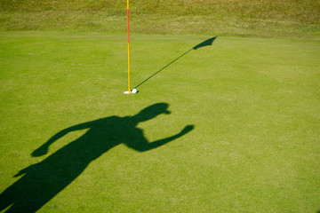Obraz premium Golfer playing golf in beautiful golf course in the evening golf course with sunshine