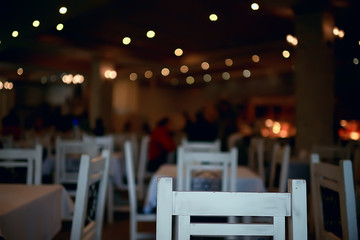 Fototapeta na wymiar background restaurant / restaurant objects on a blurred background, beautiful bokeh, vintage background color cafe