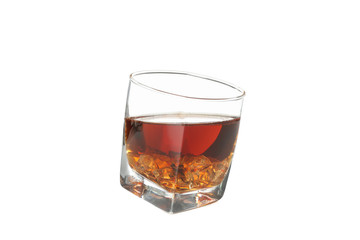 Glass of whiskey with ice cubes isolated on white background
