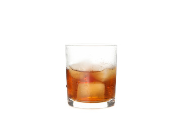 Glass of whiskey with ice cubes isolated on white background