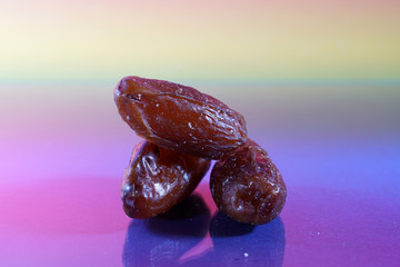 A date is the fruit of a date palm, photographed here in the studio as a detail
