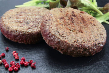 grilled beef ground steak on a plate
