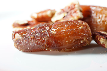 A date is the fruit of a date palm, photographed here in the studio as a detail