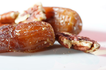 A date is the fruit of a date palm, photographed here in the studio as a detail