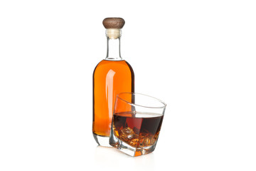 Naklejka na ściany i meble Bottle and glass with whiskey isolated on white background