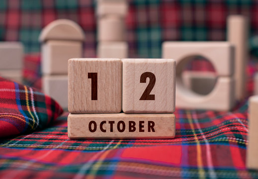 October 12 written with wooden blocks