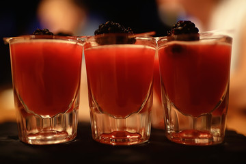 cocktail in a modern restaurant / glass with a bright cocktail in the fashionable interior serving in the restaurant, nightclub