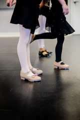 Young Girls Dancing in Tap Shoes