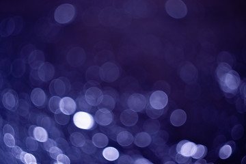 Abstract background obtained from crumpled foil with moving lighting and a defocused camera....