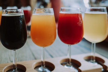 Row of colourful craft beer in sampler