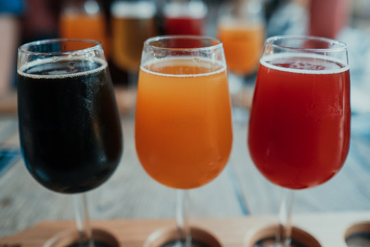 Row of colourful craft beer in sampler