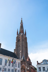 Bruges city with Church of Our Lady tower.