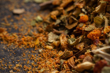 mix of spices close up on dark background