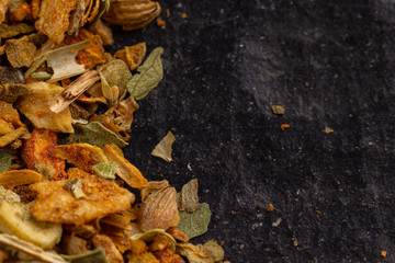 mix of spices close up on dark background