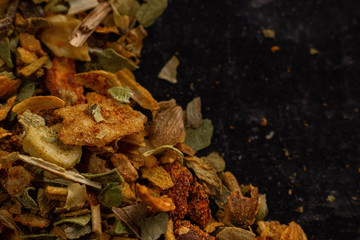 mix of spices close up on dark background
