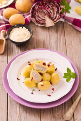 Potato gnocchi stuffed with radicchio and ricotta.