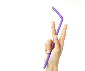 Plastic straw in the hand on a white background, stop the plastic straw and secure environment concept