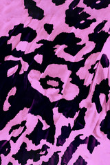 Black and pink background with leopard print, trendy leopard pattern