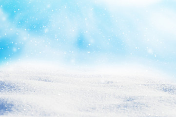 Decorative Christmas background with winter snowy blurred bokeh flakes of snow fall