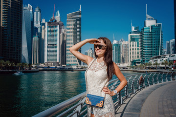Dubai travel tourist woman on vacation walking