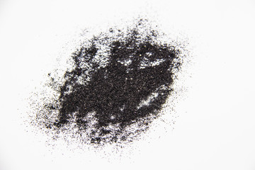 A black glitter on the white background