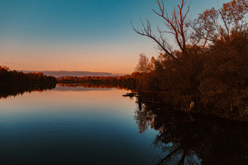Beautiful sunset with reflections near Niederpöring, Isar, Bavaria, Germany
