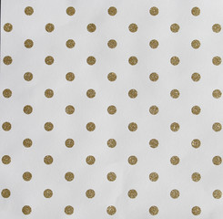 Glittery Gold dots  on a white background  