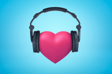 3d rendering of pink heart with black headphones on blue background