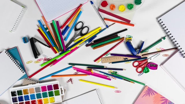 Chaos of stationery for a designer or artist looped stop motion animation logo intro. Stationery theme for company branding. The concept of a set of items to promote tools for drawing and creativity.