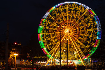 07.12.2019 Dresden. Christmas market in Dresden. A view of the Ferris wheel with a long exposure. Beautifully frozen wheel movement.
