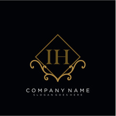 Initial letter IH logo luxury vector mark, gold color elegant classical