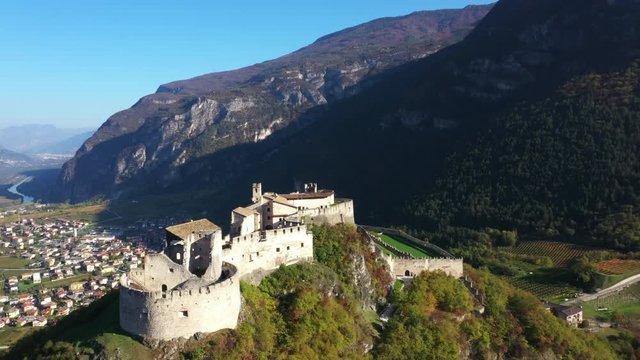 Aerial view of Castel Beseno, italy. Blue sky. Autumn season. Aerial video with drone