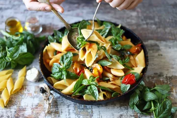 Fotobehang One pan pasta with basil. Vegan pasta. Selective focus. Macro. © Oksana
