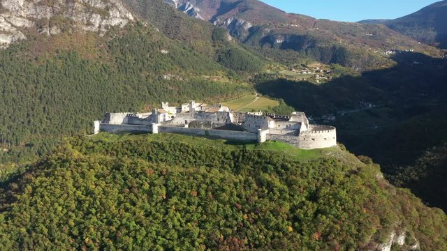 Aerial view of Castel Beseno, italy. Blue sky. Autumn season. Aerial video with drone