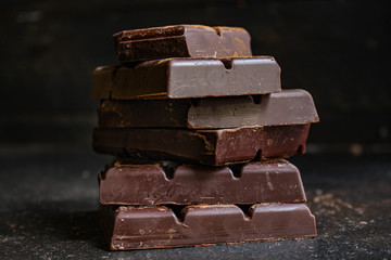 chocolate (delicious cocoa dessert, pieces of sweets) menu concept. food background. top view. copy...