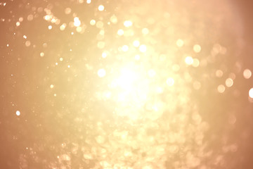 Abstract glod bokeh with glod background defocused.