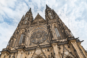 Fototapeta na wymiar St. Vitus's Cathedral in Prague Castle, Czech Republic. Low Angle View of St. Vitus Cathedral bell towers