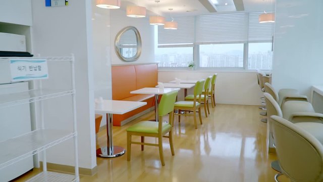 Empty bright cafe with stolam chairs