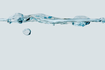 Small water wave with bubbles