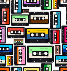 Seamless pattern with old audio cassettes colorful background