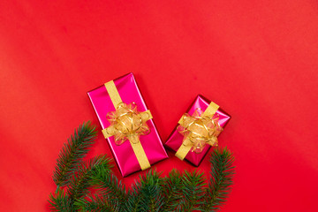 Christmas background concept. Top view of Christmas gift box gold balls with spruce branches